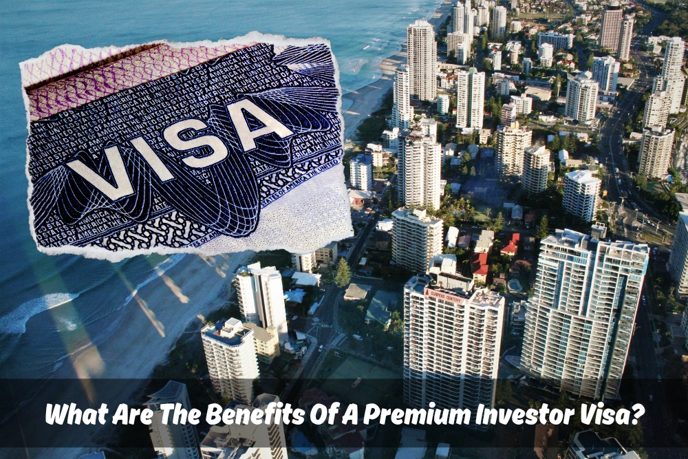 Image depicting a premium investor visa overlaying an aerial view of a coastal city with high-rise buildings. The text 'What Are The Benefits Of A Premium Investor Visa?' is prominently displayed at the bottom, highlighting the advantages of obtaining this type of visa.
