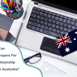 Laptop with Australian flag, glasses, and stationery, captioned 'How Can You Prepare for the Citizenship Test in Australia?